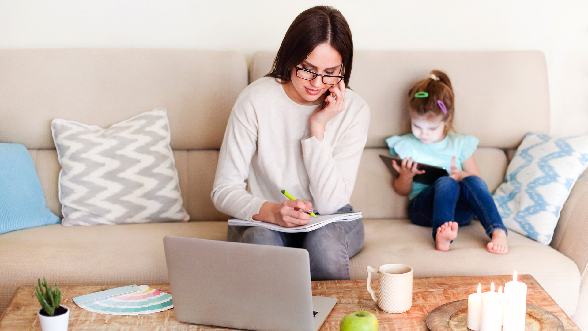 woman working from home with baby