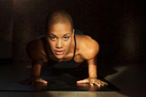 Keisha Turner doing a yoga elbow plank pose